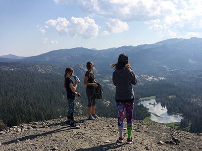 Lori enjoying hiking with her daughters